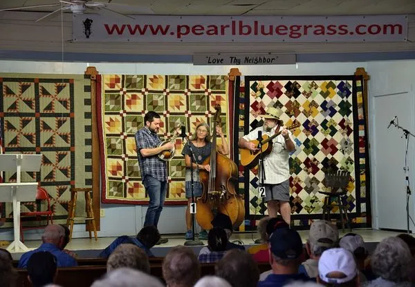 performing onstage at the Pearl, TX community center